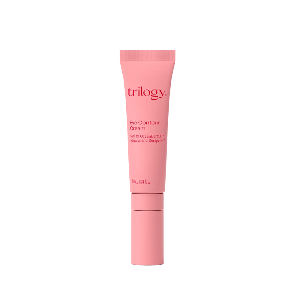 Pink eye contour cream tube with 'Trilogy' branding on a white background
