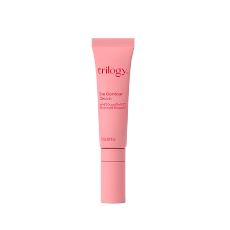 Pink eye contour cream tube with 'Trilogy' branding on a white background