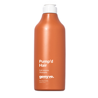 Orange shampoo bottle with white cap and text on a white background