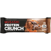 Musashi Protein Crunch Chocolate Brownie protein bar in its wrapper, featuring a black and brown design with product details and a chocolate brownie illustration.