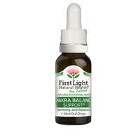Bottle of First Light Chakra Balance Support on a white background