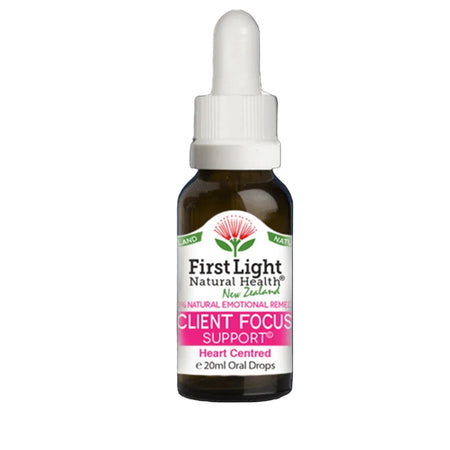 Bottle of First Light Natural Health Client Focus Support on a black background