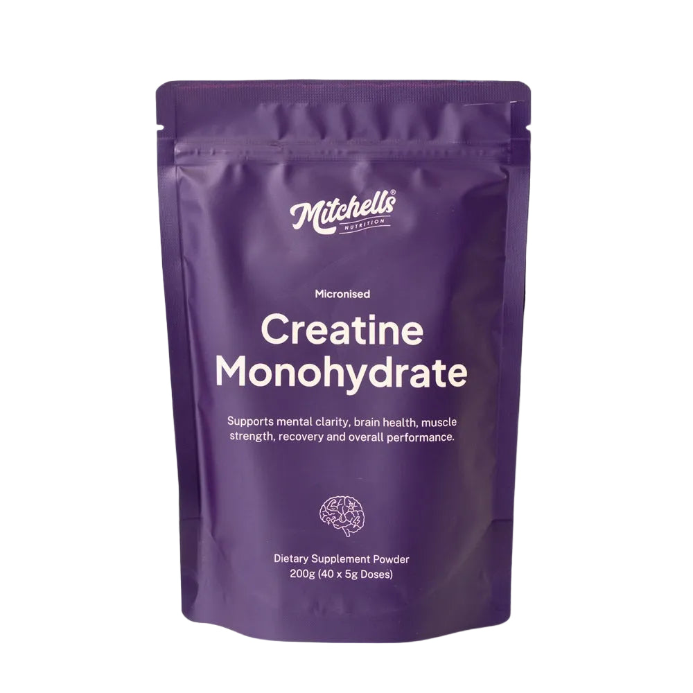 Purple package of Mitchell's Creatine Monohydrate dietary supplement on a white background