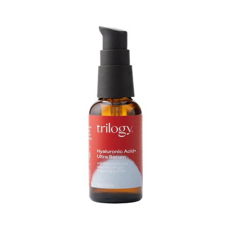 Bottle of Trilogy skincare serum on a white background