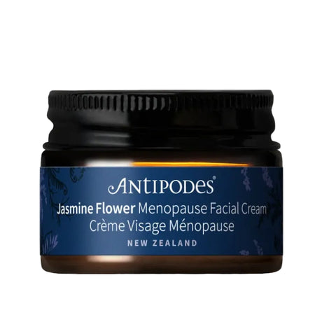 Antipodes Jasmine Flower Menopause Facial Cream jar on a beige background