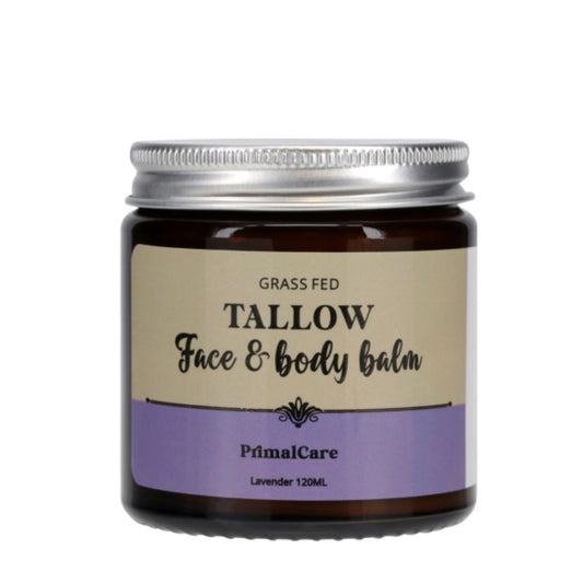 Jar of grass fed tallow face and body balm with a purple label on a white background