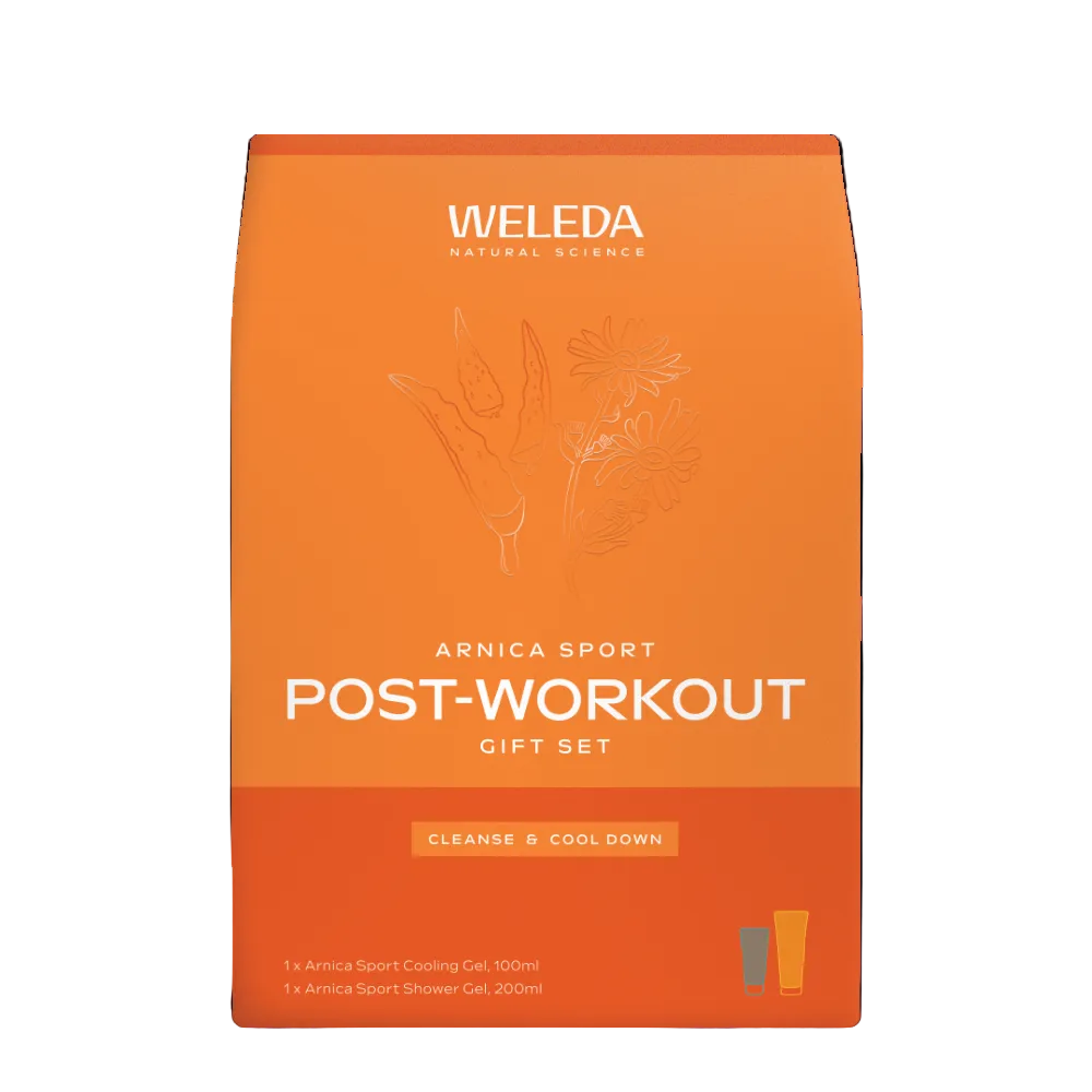 A bright orange bag of Weleda Natural Science Arnica Sport Post-Workout Gift Set, featuring white text and botanical line art, on a clean white background.