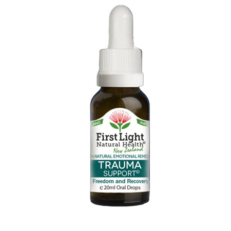 Bottle of First Light Trauma Support on a black background
