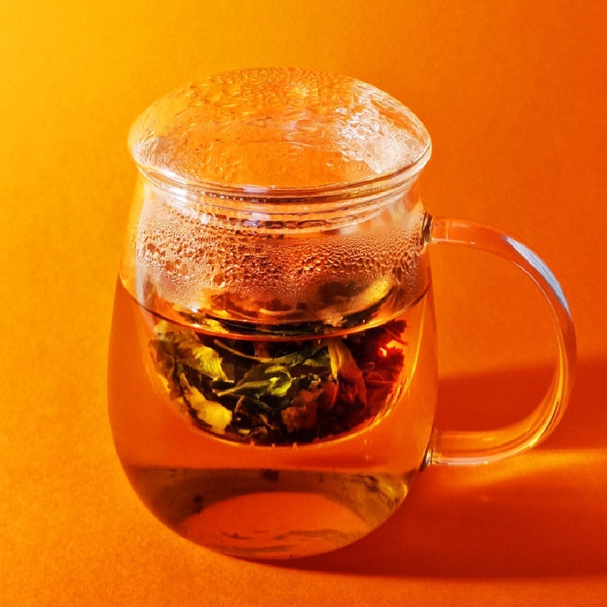  displayed with a steaming cup of freshly brewed tea. Stylish and convenient