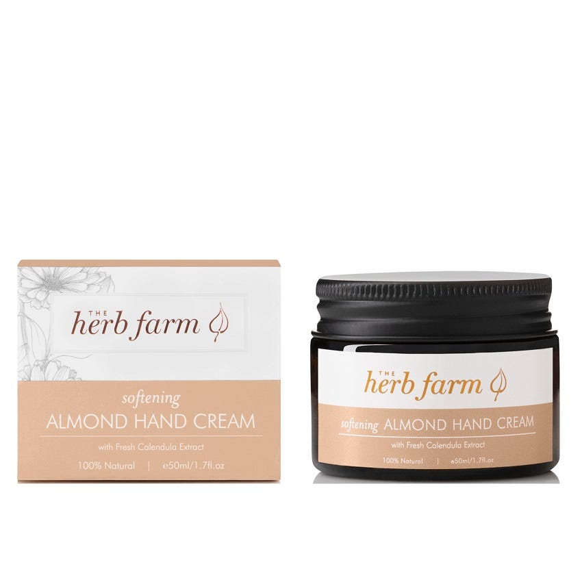 The Herb Farm Softening Almond Hand Cream, showcasing its nourishing ingredients and luxurious texture, symbolizing soft and hydrated hands, perfect for pampering and self-care.